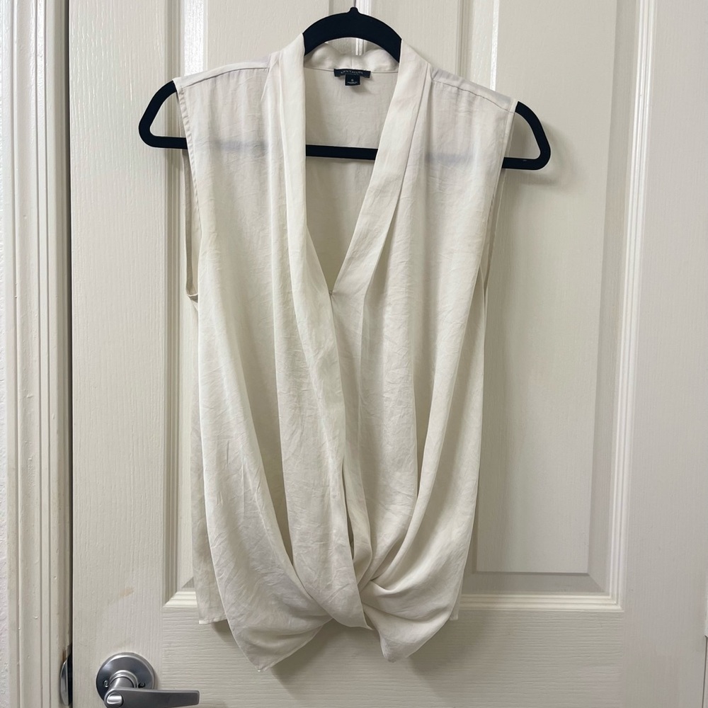 Silky sleeveless wrap blouse